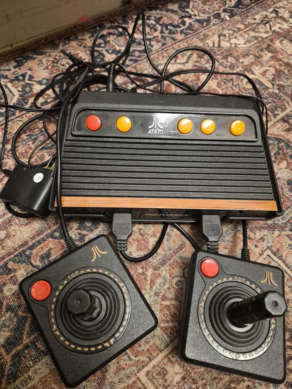 Atari Retro Console with Black and Orange Accents